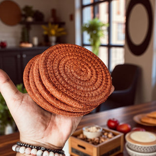 orange and white braided rope coasters cozy fall table decor
burnt rust rope coasters warm autumn coffee table accent