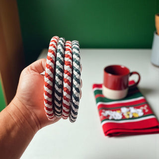 Holiday living room candy cane coasters Christmas accessories
red and white braided rope coasters Christmas kitchen decor