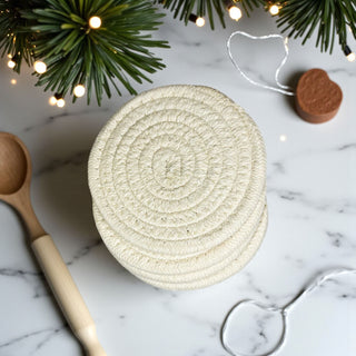Christmas table essentials braided cotton coasters for drinks
festive home gift under 25 neutral handmade coasters
cozy winter coasters gift set neutral tones for Christmas