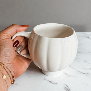 September fall decor - ceramic pumpkin coffee mugs for autumn home styling
October Halloween prep - pumpkin shaped coffee cups for seasonal decorating