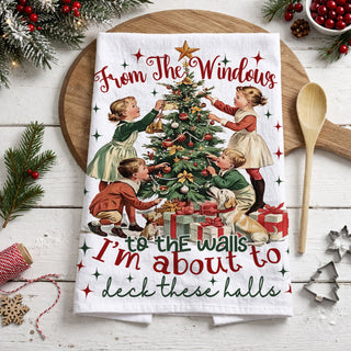 Vintage Christmas kitchen towel humor
classic christmas dish towel with festive quote and tree
vintage style christmas towel with kids decorating tree
deck the halls towel with retro holiday theme